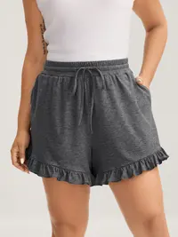 BLOOMCHIC Plus Size Women's Lounge Shorts [M-6X] - Soft Knit Ruffle Hem Shorts with Elastic Drawstring Waist & Pockets, Relaxed Comfy Fit, Summer Casual Everyday Bottoms,Soft Comfy Relaxed Fit,Drawstring,Ruffled,Flattering Fit,Women's Bottoms,Summerfinds