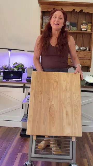 Origami foldable kitchen cart with solid wood top and rolling storage shelves for small kitchens, apartments, and prep spaces. Space-saving kitchen island cart for extra counter space, organized storage, meal prep, baking, and flexible kitchen organization that folds away when not in use. #kitchenorganization #smallkitchen #kitchencart #spacesaving #homeorganization 