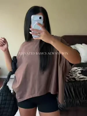 SIZE: M. COLOR: DARK BROWN. Oh I love an oversized T-shirt elevated basic I can wear all year!! I love styling these so much! U have so many colors and they look good with jeans, shorts, and even leggings! The best batwing, split hem detail! Oversized T-shirt. Elevated Basic T-shirt. Batwing T-shirt. #batwing #tshirt #tshirts #elevatedbasics #basictee 