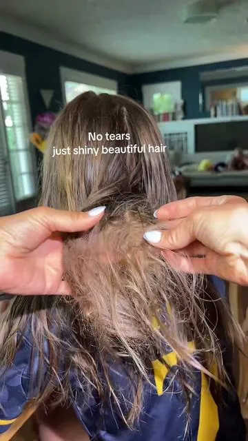 My daughter has the kind of tangles that usually end in tears… until I found this. A few pumps of Bare Anatomy Ultra Smoothing Hair Serum and the brush glides right through. It melts through knots, leaves her hair silky smooth, adds gorgeous shine, and helps protect her strands from damage. Detangling time is finally stress-free for both of us. #HairCare #Detangling #LongHairCare #HealthyHair #MomFinds @Bare Anatomy Haircare 