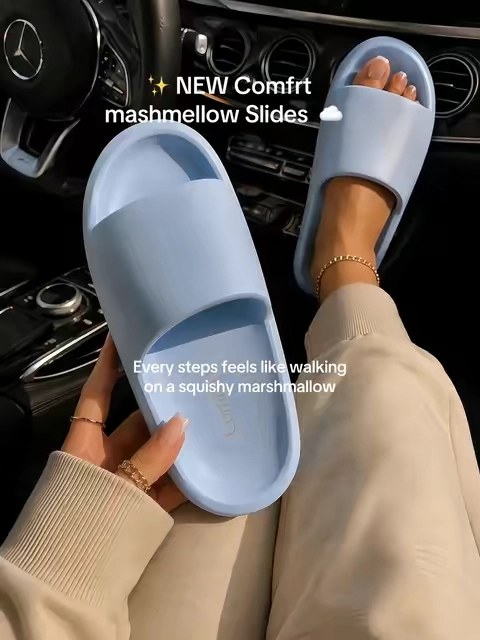 These Comfrt Marshmallow Slides feel like walking on soft, bouncy clouds! The thick 1.4-inch EVA cushioning provides comfortable support while the lightweight slip-on design makes them perfect for lounging at home, running errands, traveling, or wearing after a long day. Available in so many cute colors! #Comfrt #MarshmallowSlides #ComfySlides #CloudSlides #houseslippers 